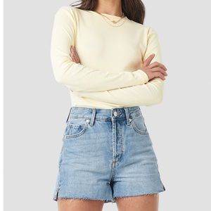 Light denim shorts. Never worn.